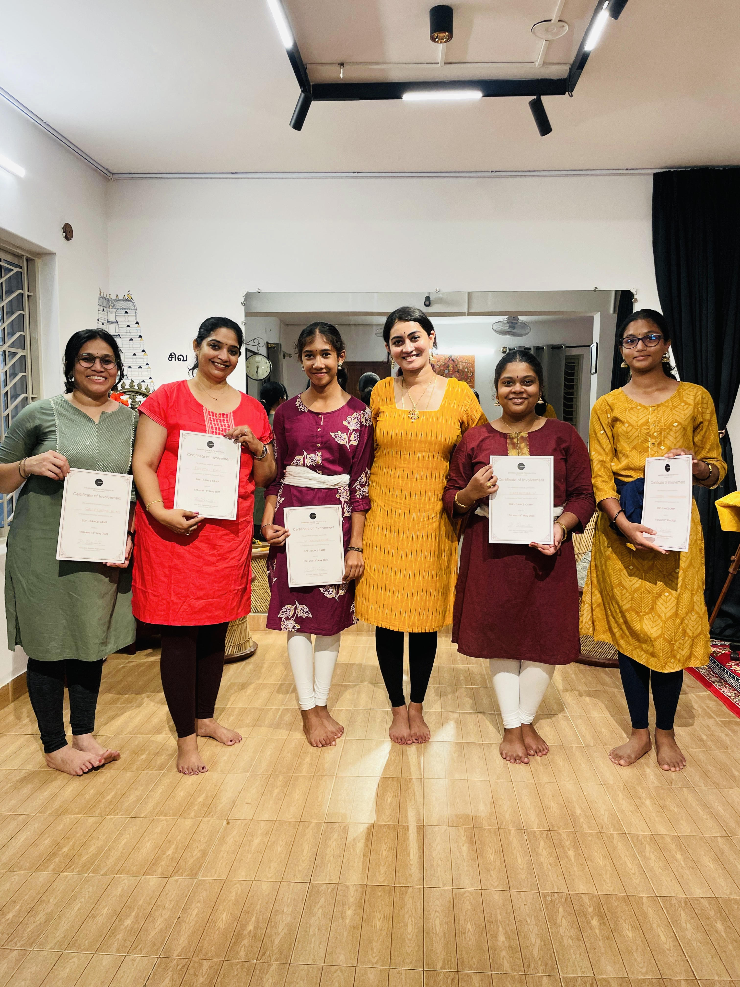 Bharatanatyam dance camp students receiving certificates at Samridhi Dance Foundation workshop